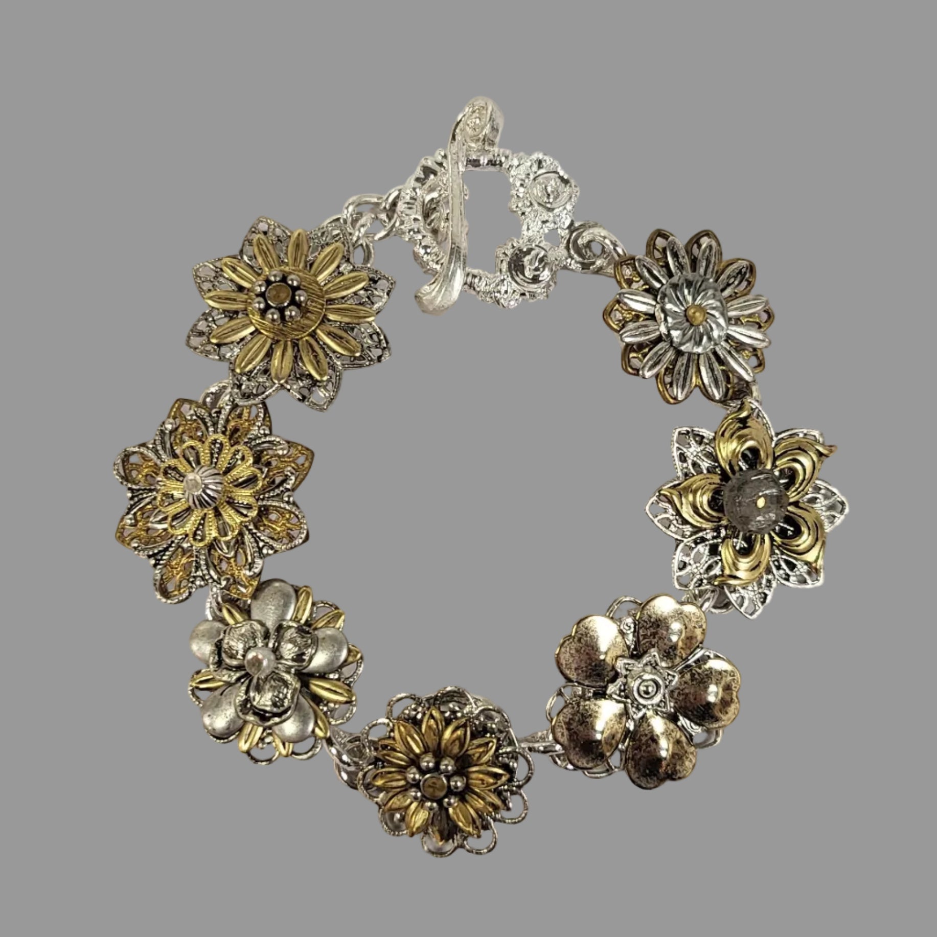 Mixed metals link bracelet